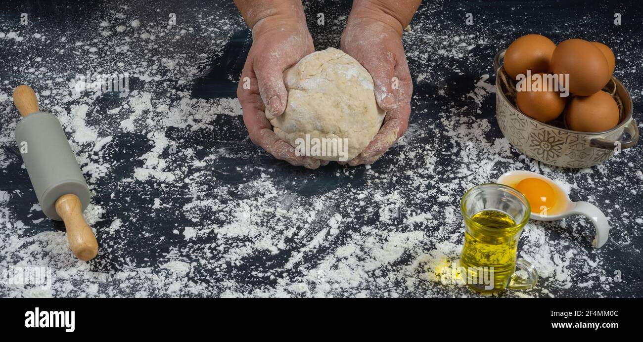 kneading homemade bread with flour, water and salt Stock Photo Alamy