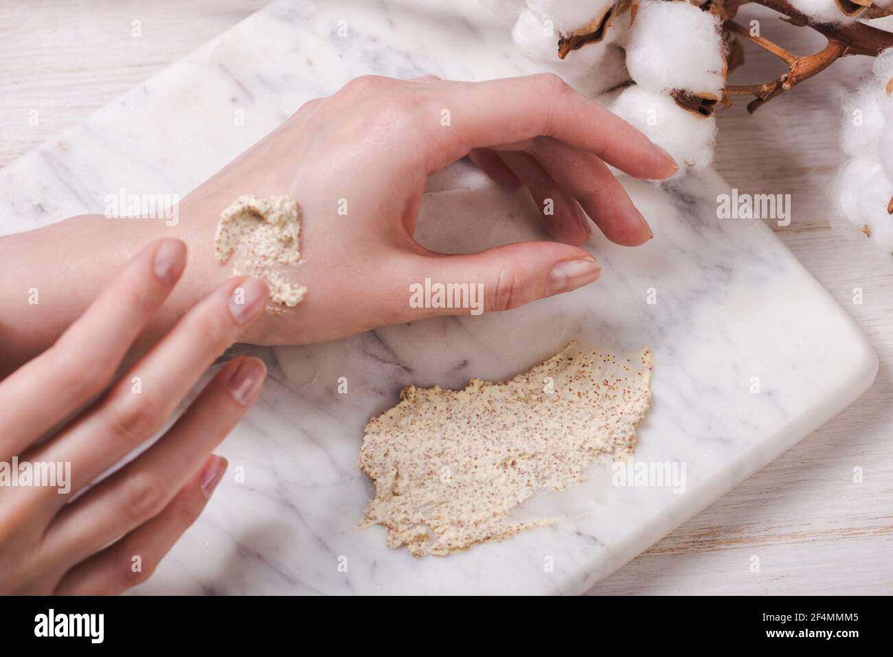 Natural body scrub on marble background. Cosmetic face cream container with care cruelty-free product. Flat lay, top view Stock Photo