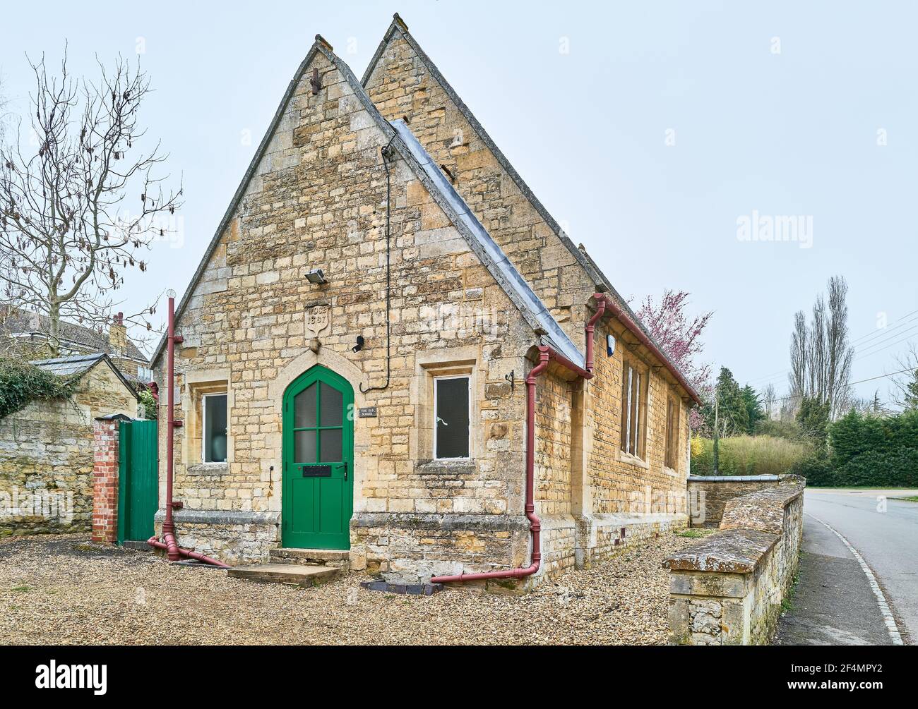 The old school, built 1867, at Great Oakley, Corby, England Stock Photo