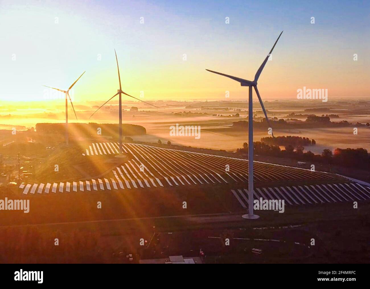 This drone Image was taken above Gelderland looking at 3 power generators at early morning. Stock Photo