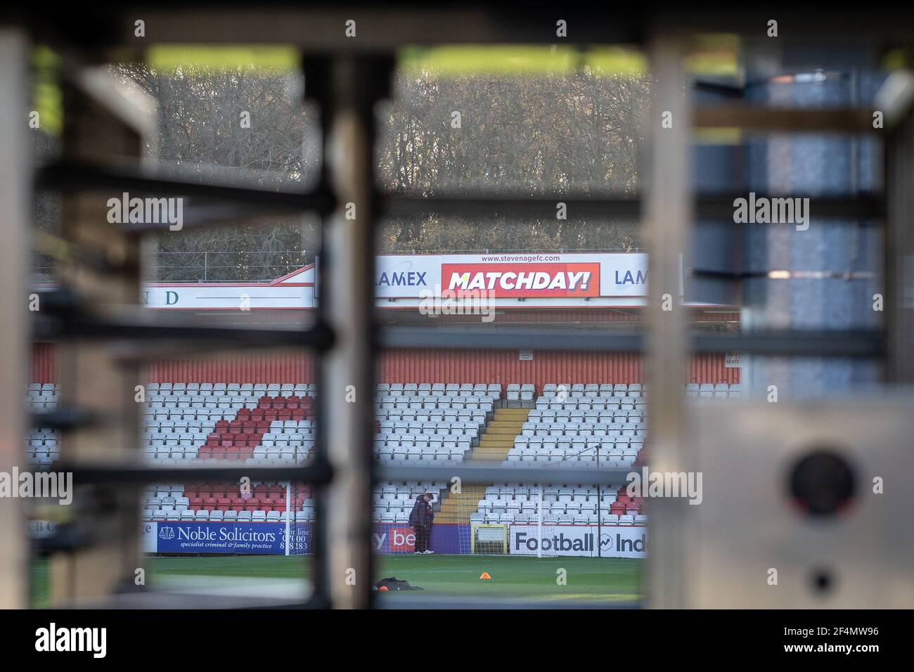 Football stadium turnstile viewed from the outside looking in on match day at Lamex Stadium, Stevenage Football Club, Stevenage, Hertfordshire, UK Stock Photo