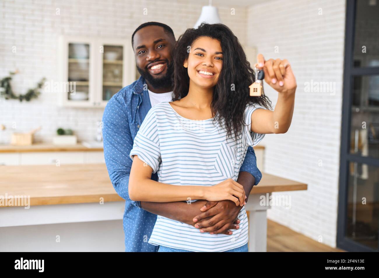 African american hand holding key hi-res stock photography and images ...
