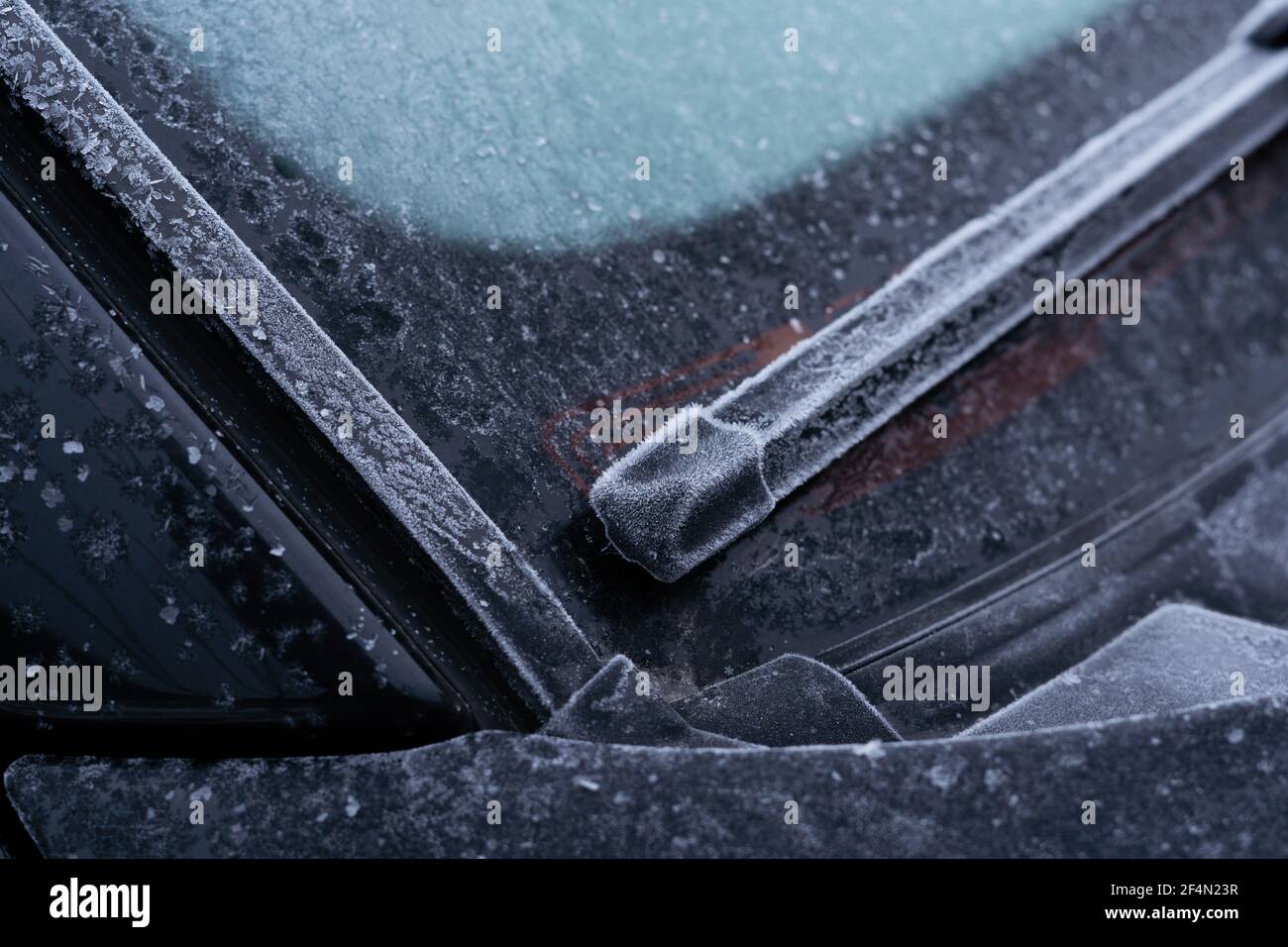 Windshield wipers in a car covered with frost in the morning of winter Stock Photo Alamy