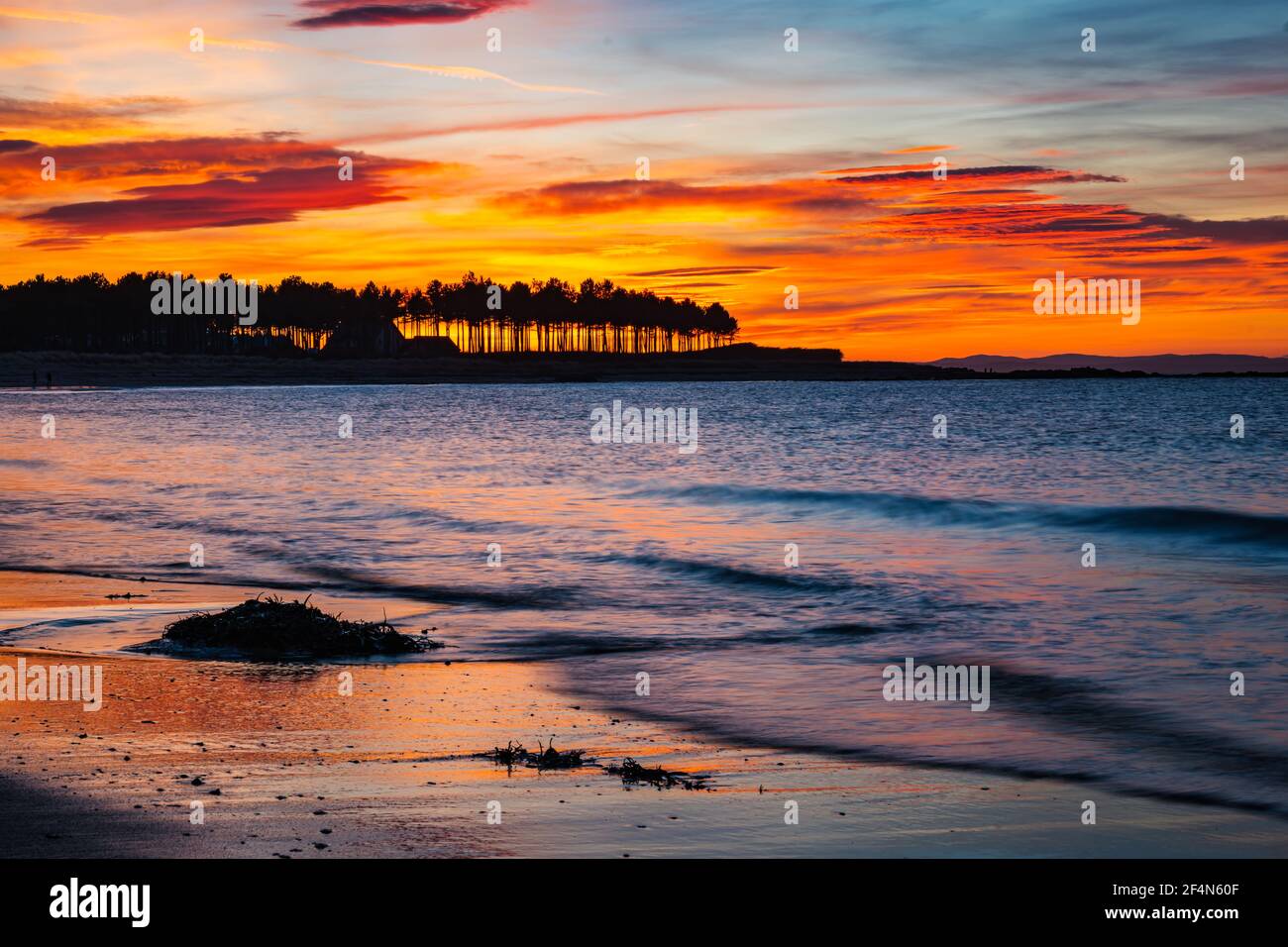 Colourful sunset at Yellowcraig beach, East Lothian, Scotland, UK Stock Photo