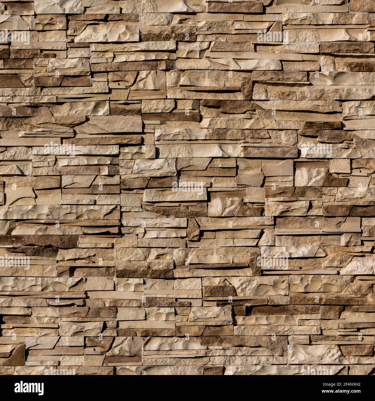 Seamless texture of clinker on the wall in the form of wild stone. Beige  and brown tones with shadows and deep texture Stock Photo - Alamy