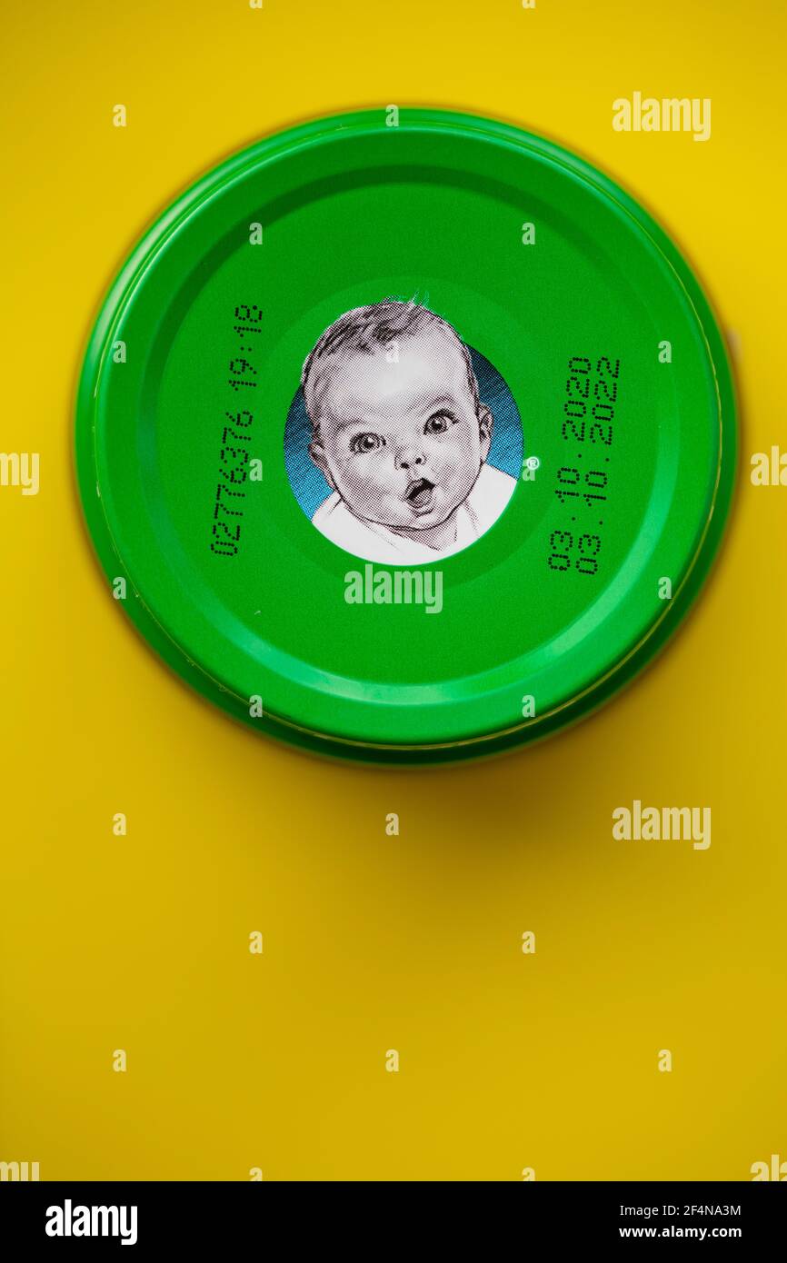 Lviv, Ukraine - March 22, 2020:  Gerber brand child nutrition puree on yellow background Stock Photo