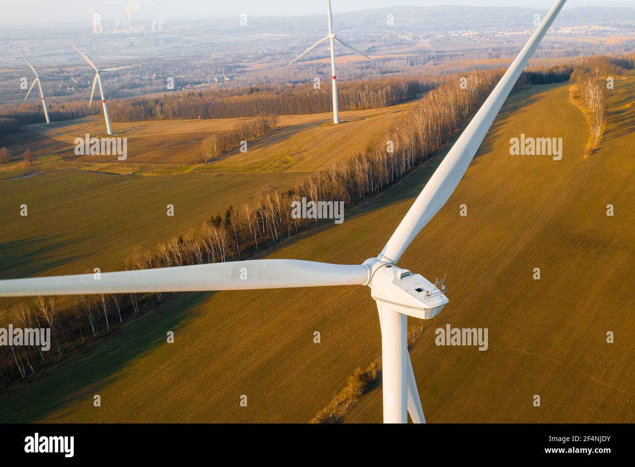 Aerial view of screw of the windmill or wind turbine on the field at sunlight Stock Photo
