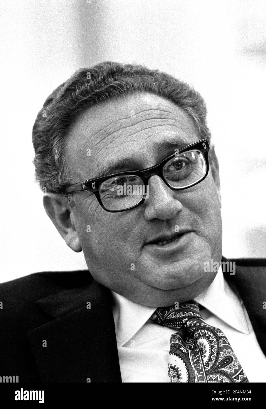 Henry Kissinger. Portrait of US Secretary of State, Henry Alfred Kissinger (b. Heinz Alfred Kissinger, 1923) during a Meeting in the Oval Office, 1975 Stock Photo