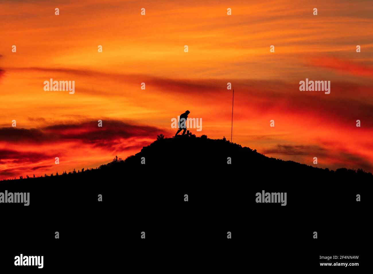Ataturk silhouette. Climb the mountain with a magnificent cloudy sky sunset. Stock Photo