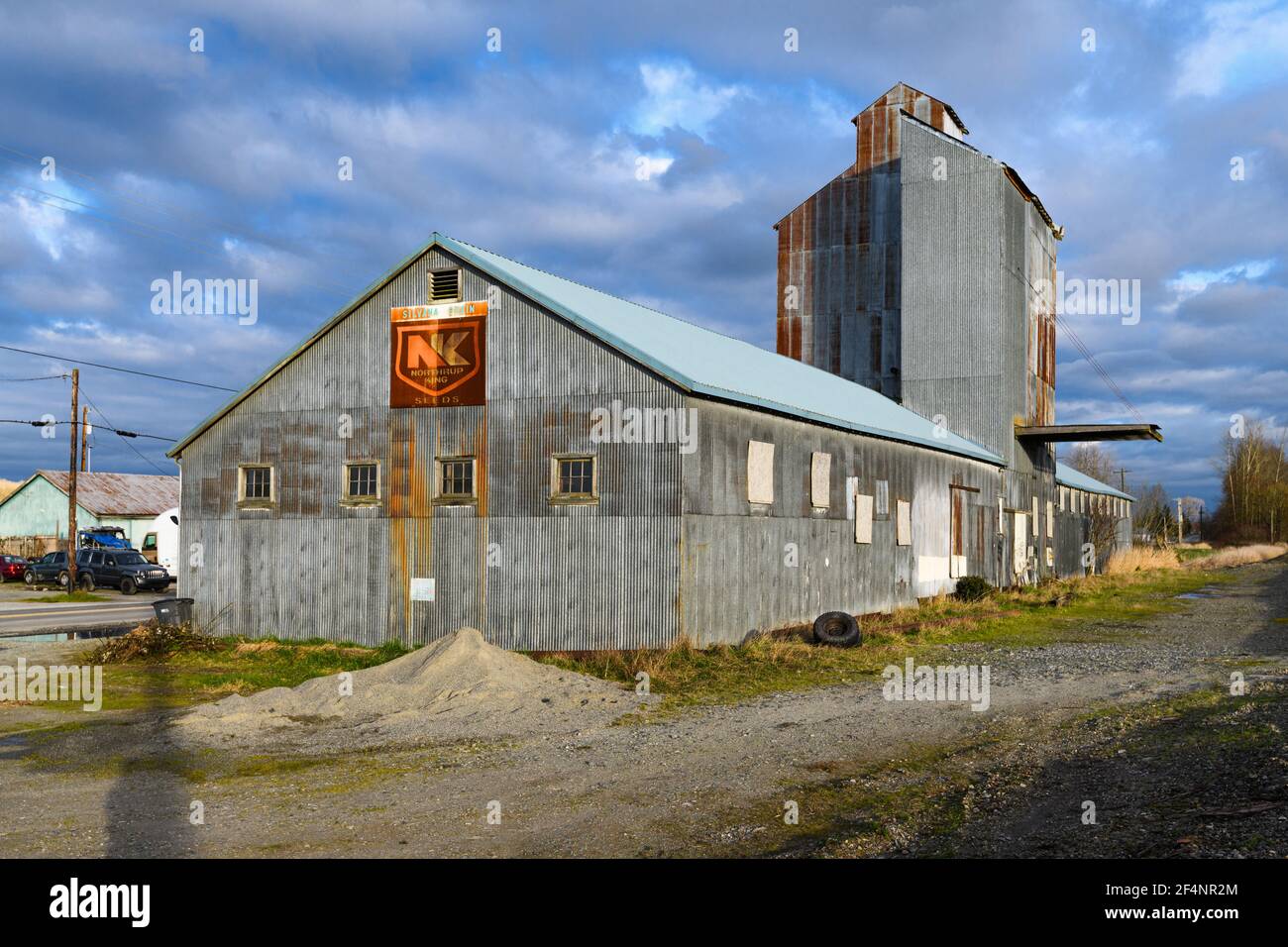 Northrup King Seeds metal warehouse in Snohomish County Washington, formerly the Silvana Grain building Stock Photo