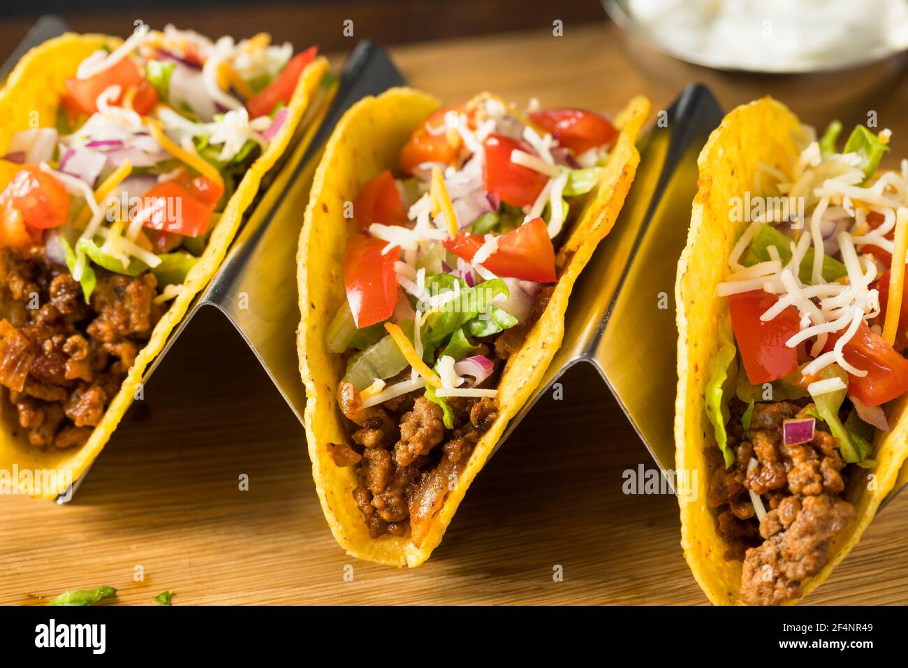 Homemade Ground Beef Hard Shell Tacos with Lettuce and Tomato Stock