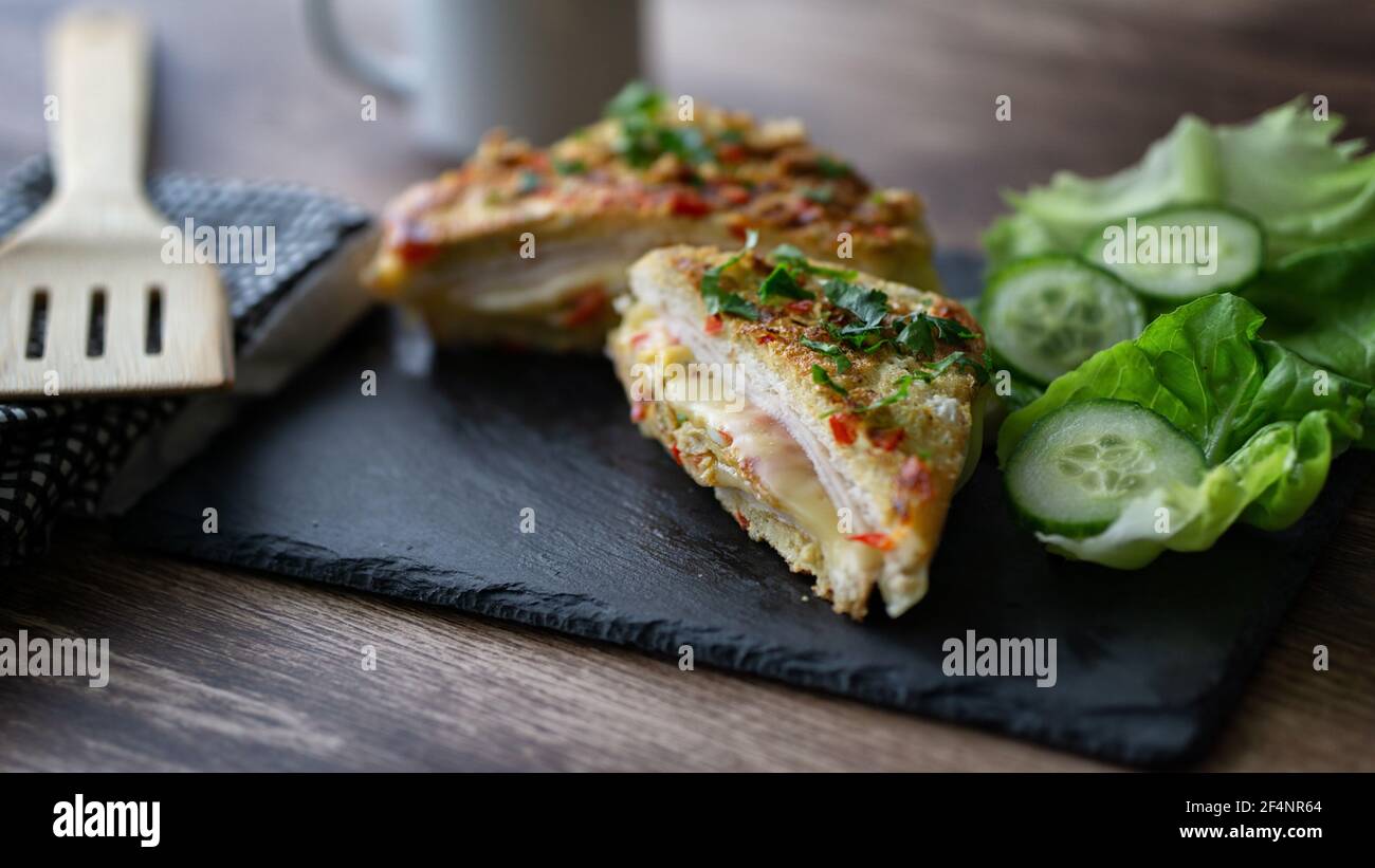 French toast omelette sandwich simple and easy breakfast dish . Indian