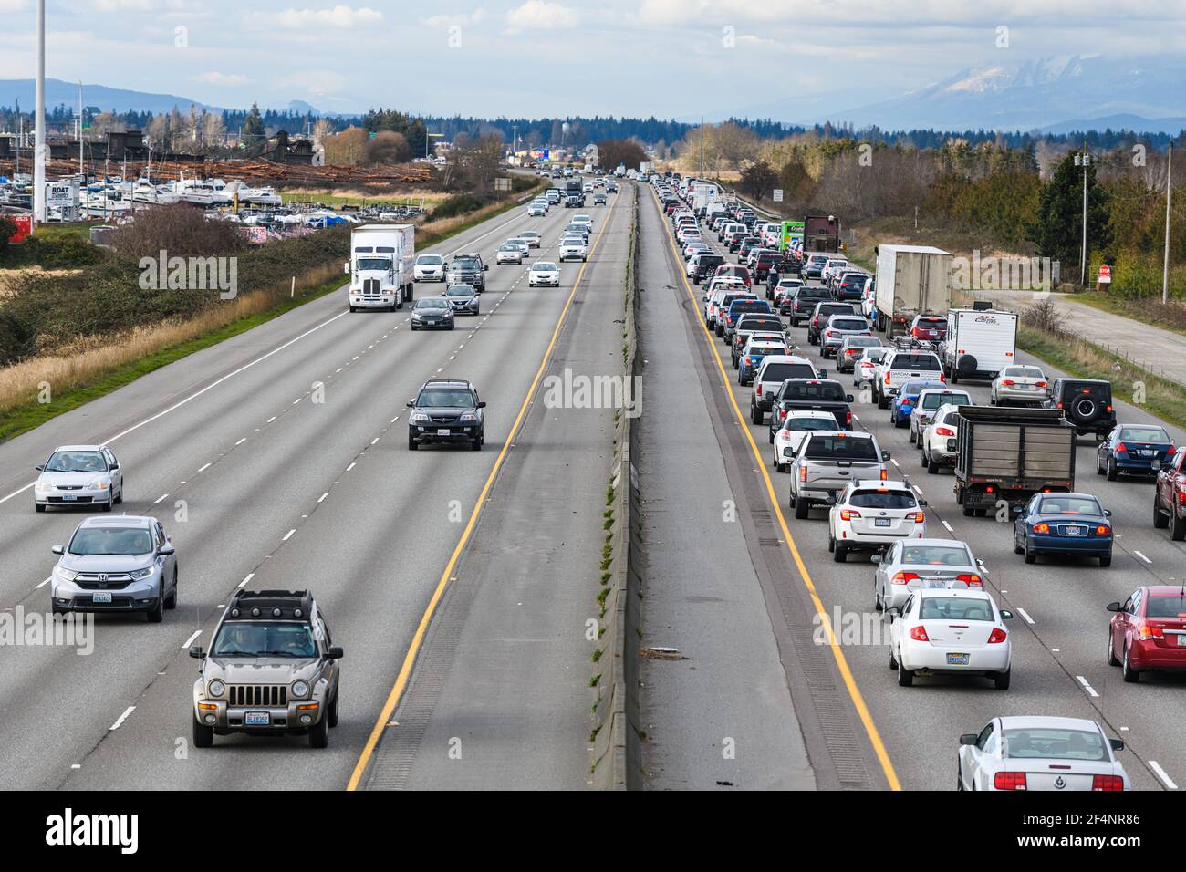 Evening commuters in congestion on Interstate 5 driving home with