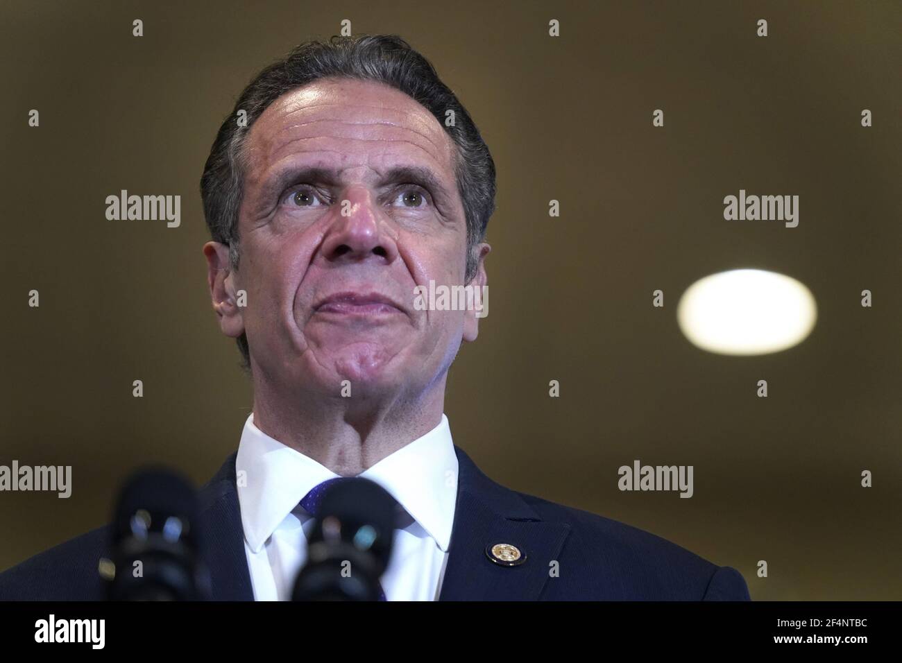 Mt. Vernon, United States. 22nd Mar, 2021. New York Governor Andrew Cuomo listens to speakers at Grace Baptist Church, a new pop-up vaccination site, in Mt. Vernon, New York on Monday, March 22, 2021. Cuomo was there to encourage all people to get vaccinated, especially those in underserved communities that were the most effected by the pandemic. Pool Photo by Seth Wenig/UPI Credit: UPI/Alamy Live News Stock Photo