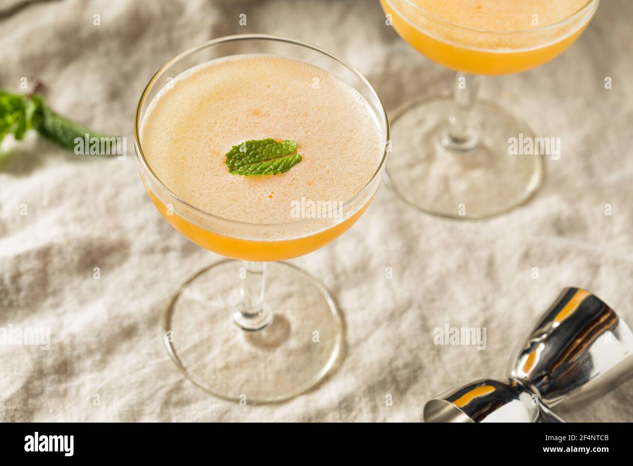 Refreshing Boozy Honeysuckle Cocktail with Rum and Honey Stock Photo