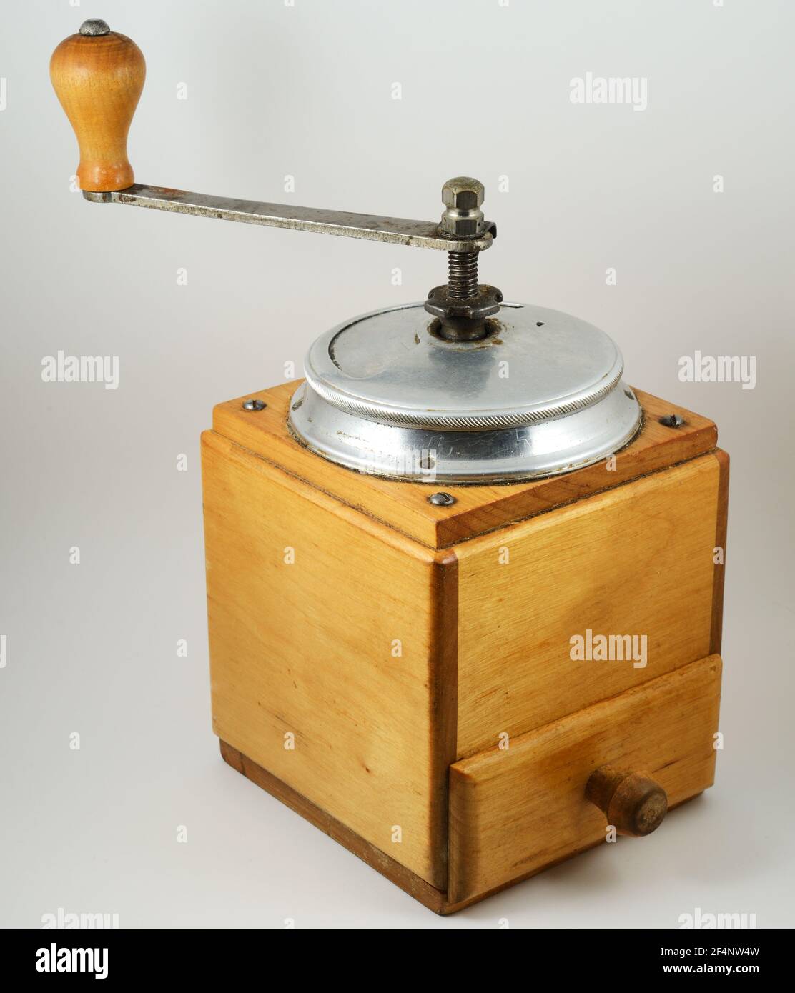 old vintage coffee grinder on a neutral background Stock Photo