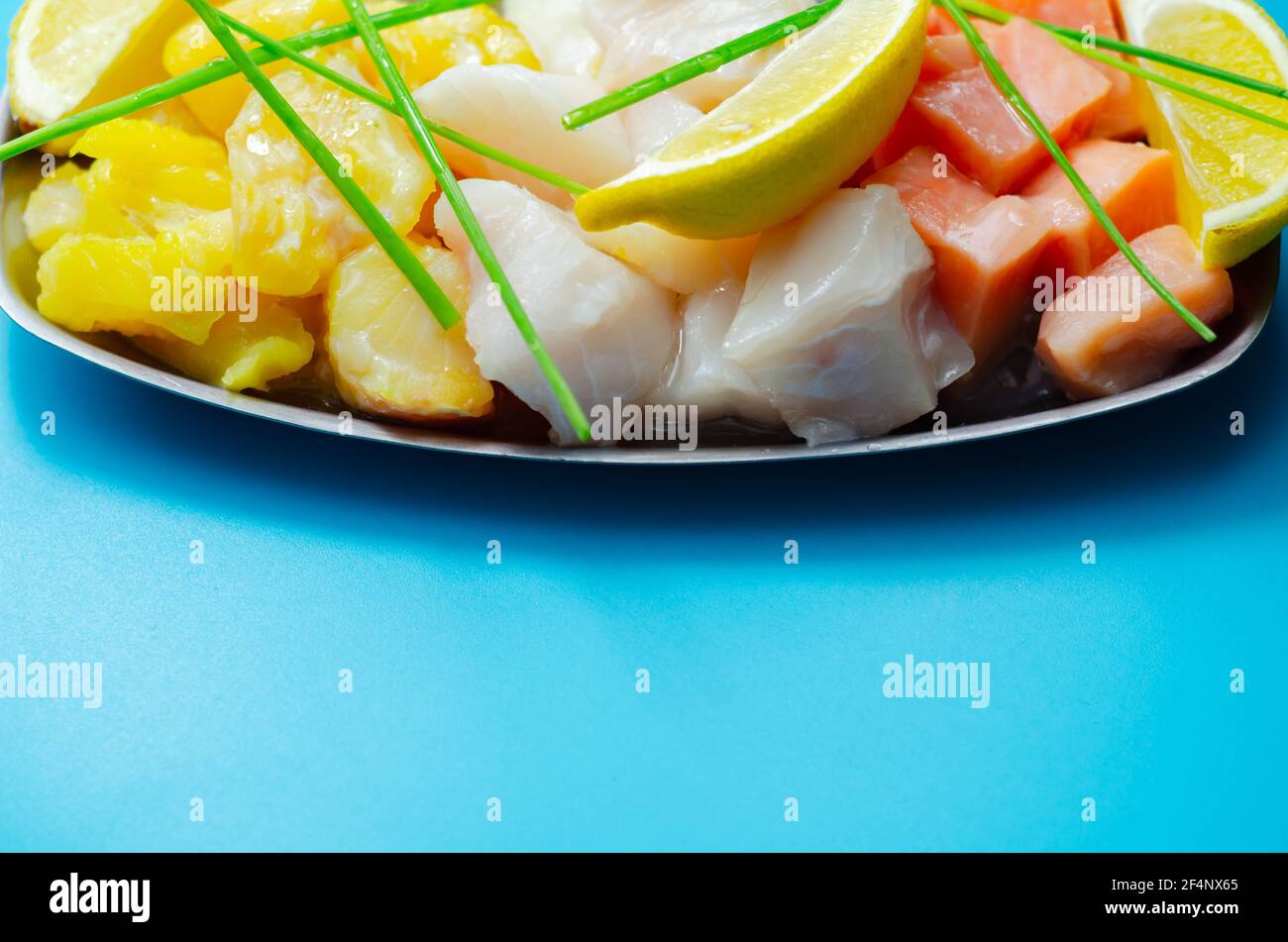 Fish pie mix, defrosted, skinless and boneless cod, dyed smoked haddock