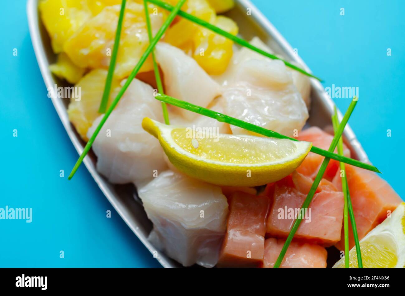 Fish pie mix, defrosted, skinless and boneless cod, dyed smoked haddock