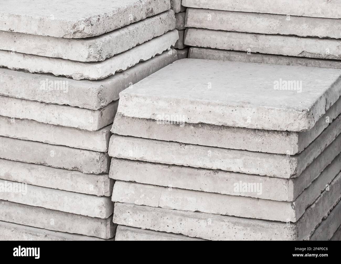 Old gray concrete plates. Building cement materials at the construction site. Stock Photo