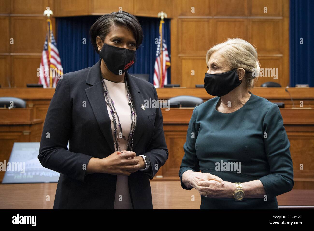 Washington, United States. 22nd Mar, 2021. Washington Mayor Muriel Bowser and Chairwoman Carolyn Maloney, D-N.Y., talk at the end of the House Oversight and Reform Committee hearing on the District of Columbia statehood bill, on Capitol Hill in Washington on Monday, March 22, 2021. Pool Photo by Caroline Brehman/UPI Credit: UPI/Alamy Live News Stock Photo