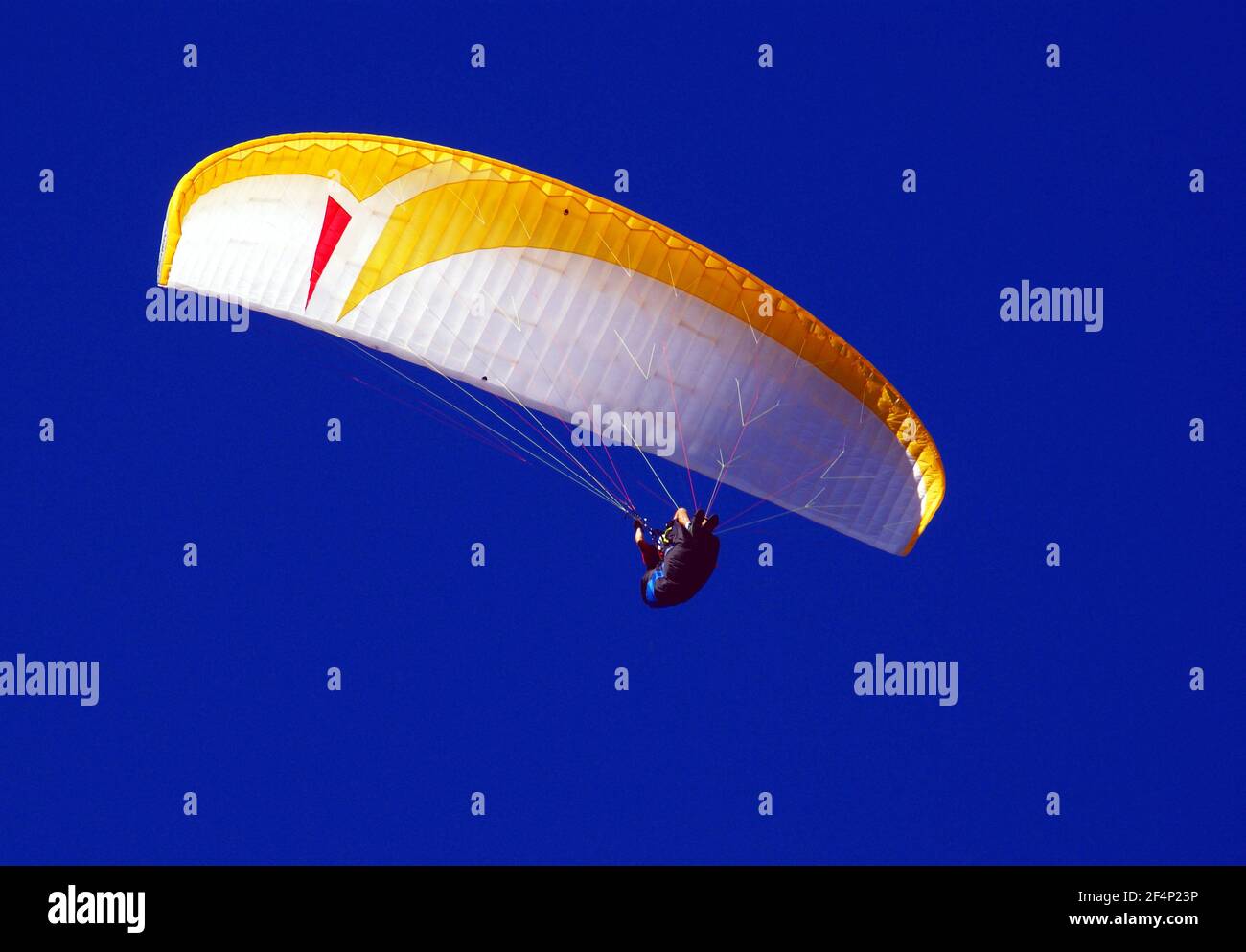 Windblown canvas blown by the wind on fonf of blue sky. Stock Photo