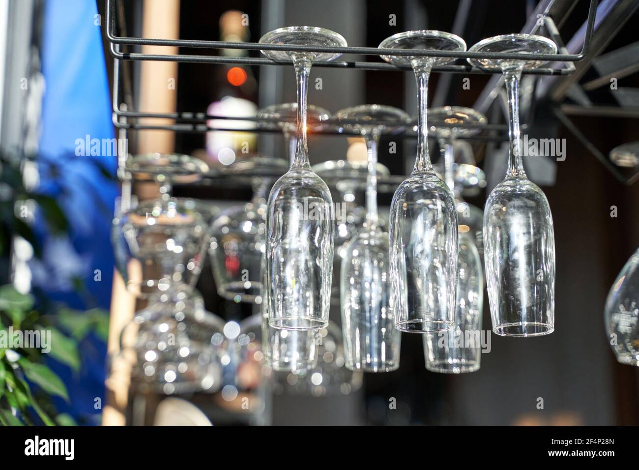 Wine glasses upside down. Clean cafe drink cup. Empty bar. Bistro