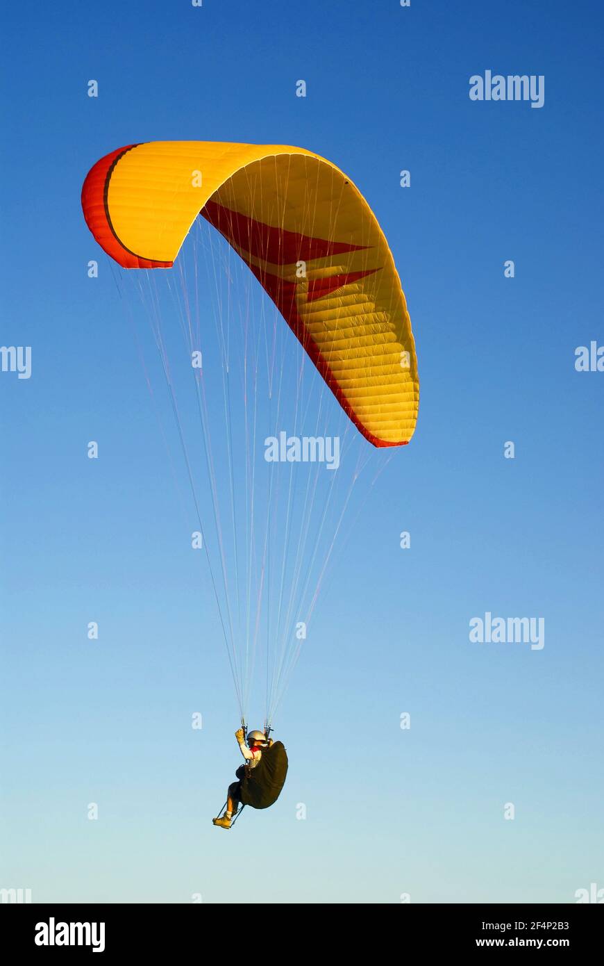 Windblown canvas blown by the wind on fonf of blue sky. Stock Photo