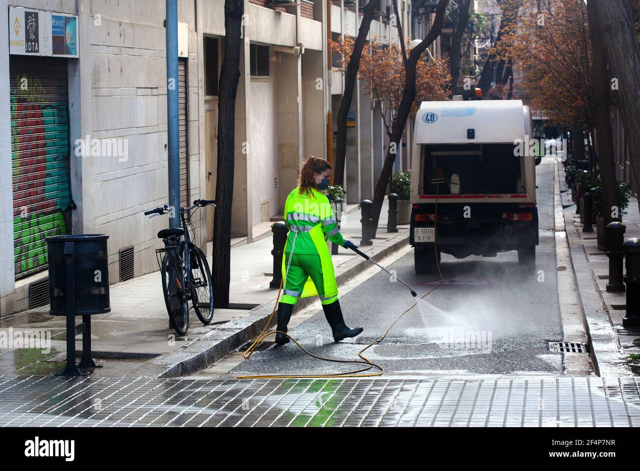 Street cleaner cleaning the streets, Barcelona Stock Photo Alamy