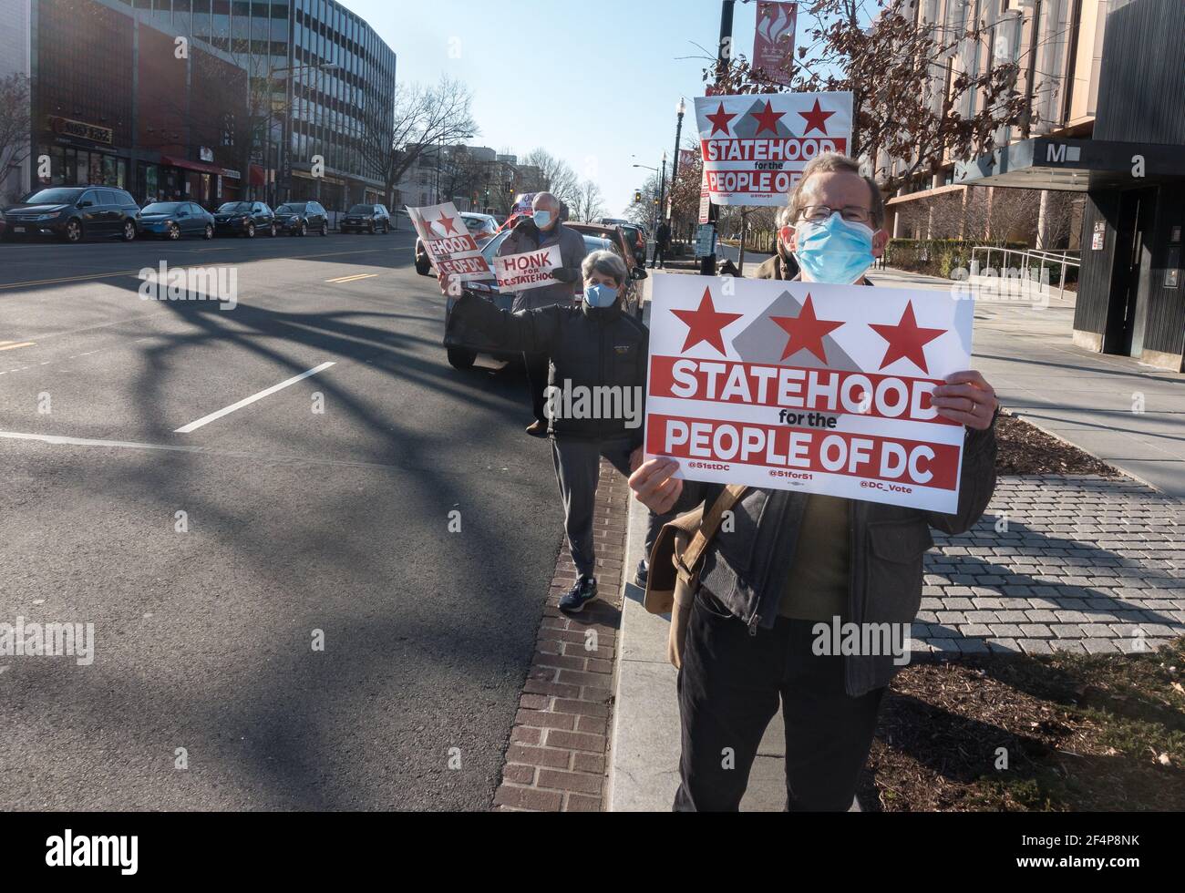 WASHINGTON, DC - MAR. 22, 2021: Residents show support for making DC the 51st state at one of several demonstrations in DC on the day the House of Representatives holds hearing on adding the District of Columbia as the 51st state, something long sought by residents of Washington who do not have voting representation in Congress. Stock Photo