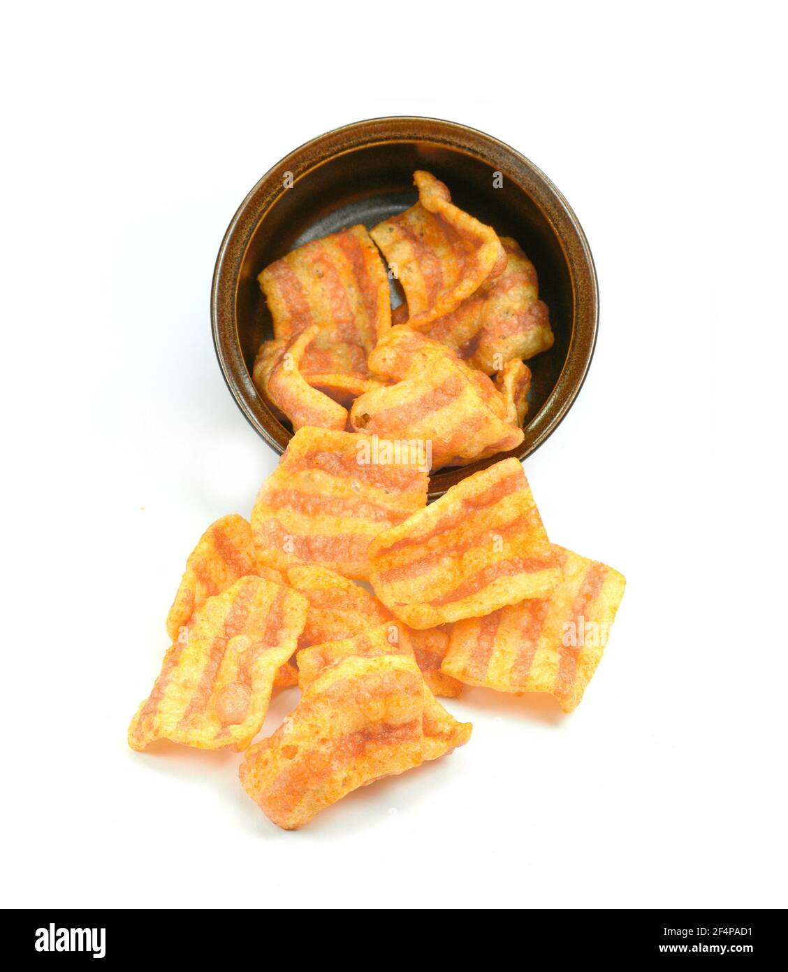Bowl of baconflavored puffed wheat chips. Bacon Chips. Delicious bacon