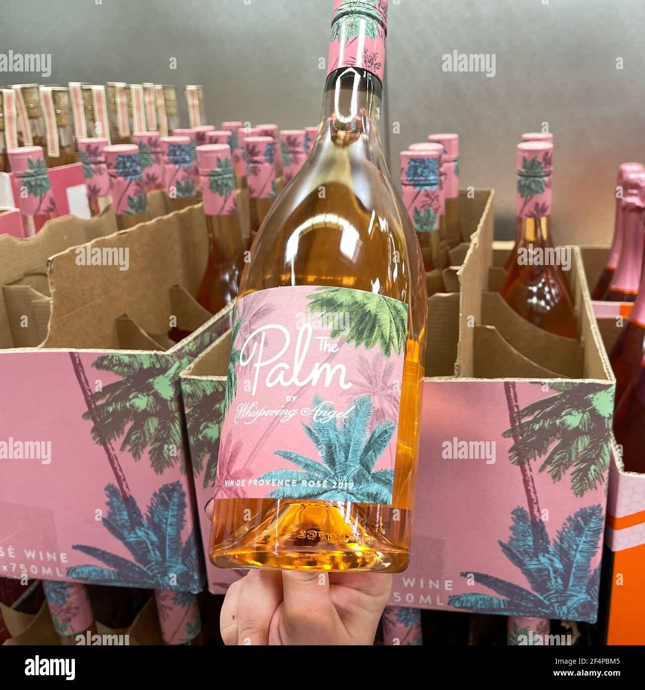 Orlando, FL USA - March 14, 2021:  Bottles of The Palm by Whispering Angel Rose Wine at a Sams Club in Orlando, Florida. Stock Photo