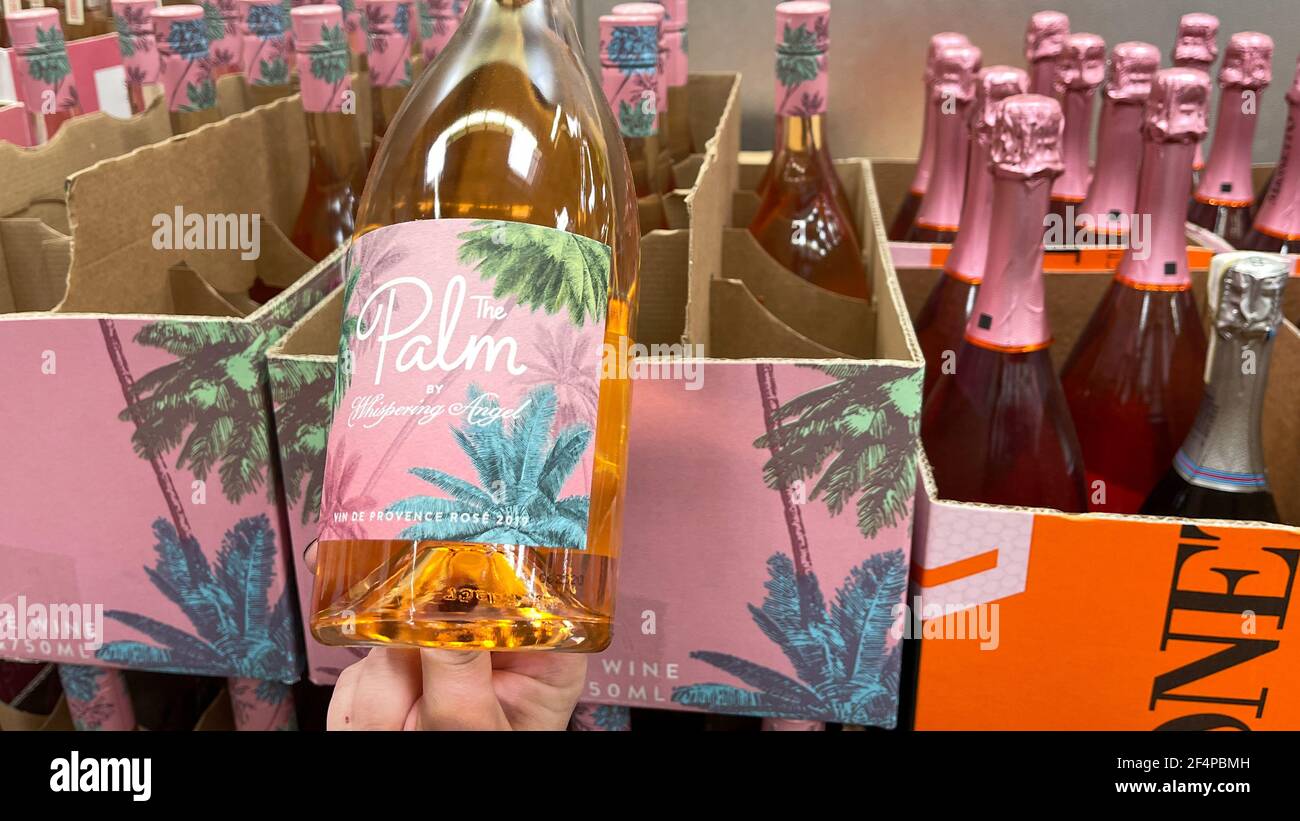 Orlando, FL USA - March 14, 2021:  Bottles of The Palm by Whispering Angel Rose Wine at a Sams Club in Orlando, Florida. Stock Photo