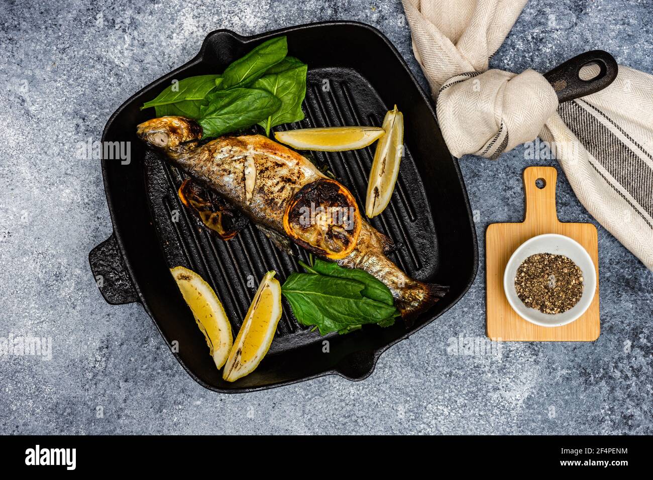 Grilled trout fish with lemon Stock Photo Alamy