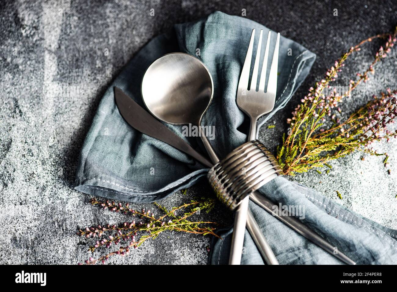 Easter table setting with flowers Stock Photo