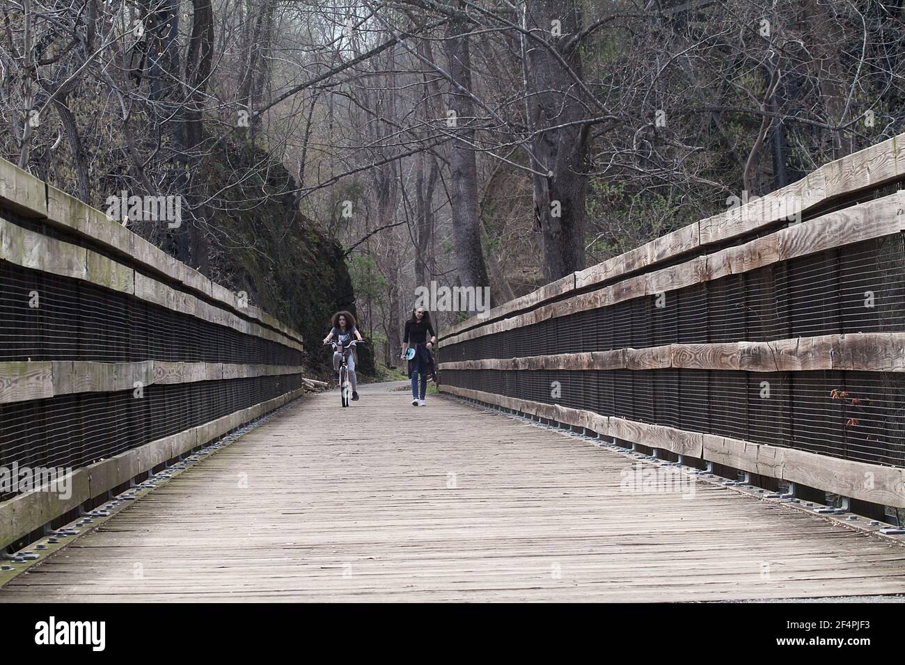 Lynchburg, VA, USA. Two girls on a the James River trail Stock Photo