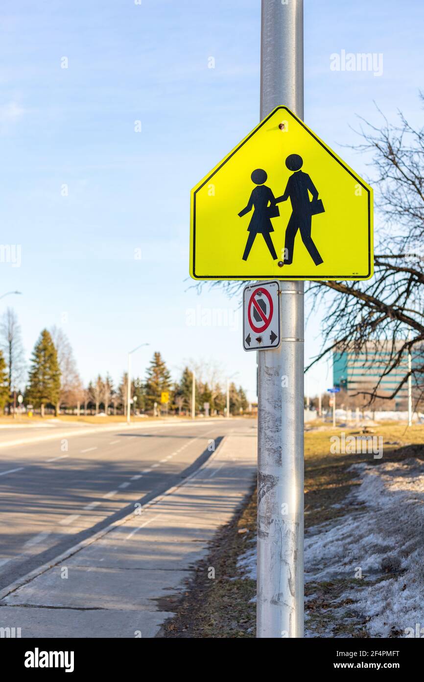 Ottawa, Canada - March 19, 2021: School Ahead sign on the road in Ottawa, Canada Stock Photo