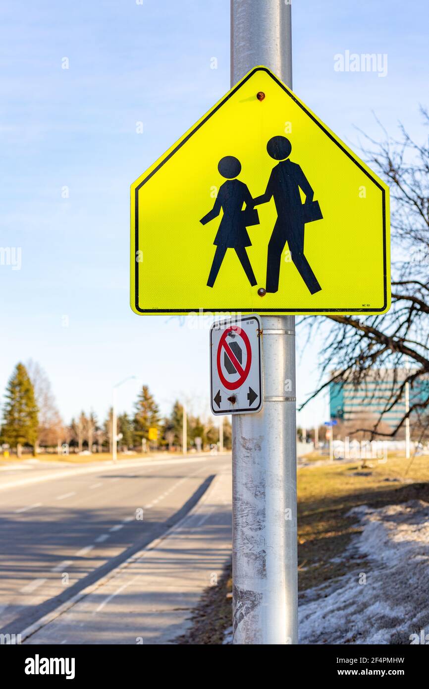 Ottawa, Canada - March 19, 2021: School Ahead sign on the road in Ottawa, Canada Stock Photo