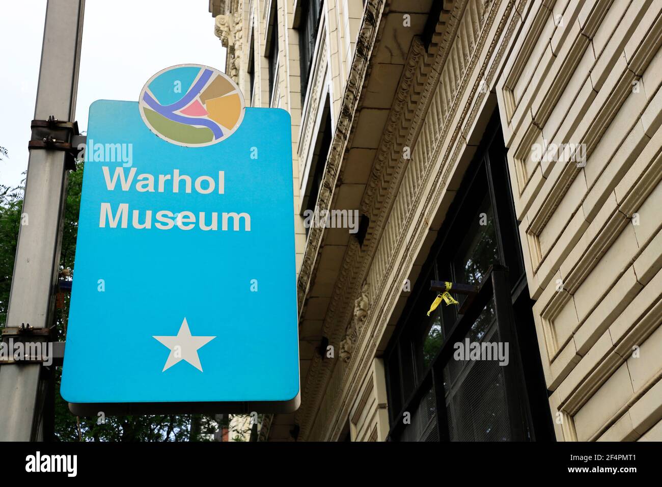 The sign board of The Andy Warhol Museum outside the museum building.Pittsburgh.Pennsylvania.USA Stock Photo