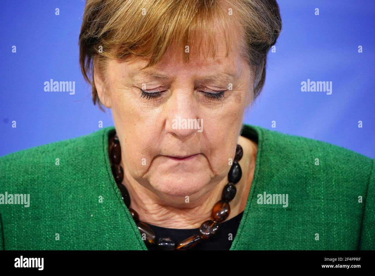 German Chancellor Angela Merkel looks down during a news conference after a meeting with state leaders to discuss options beyond the end of the pandemic lockdown, amid the outbreak of the coronavirus disease (COVID-19), in Berlin, Germany, March 23, 2021. Michael Kappeler/Pool via REUTERS Stock Photo