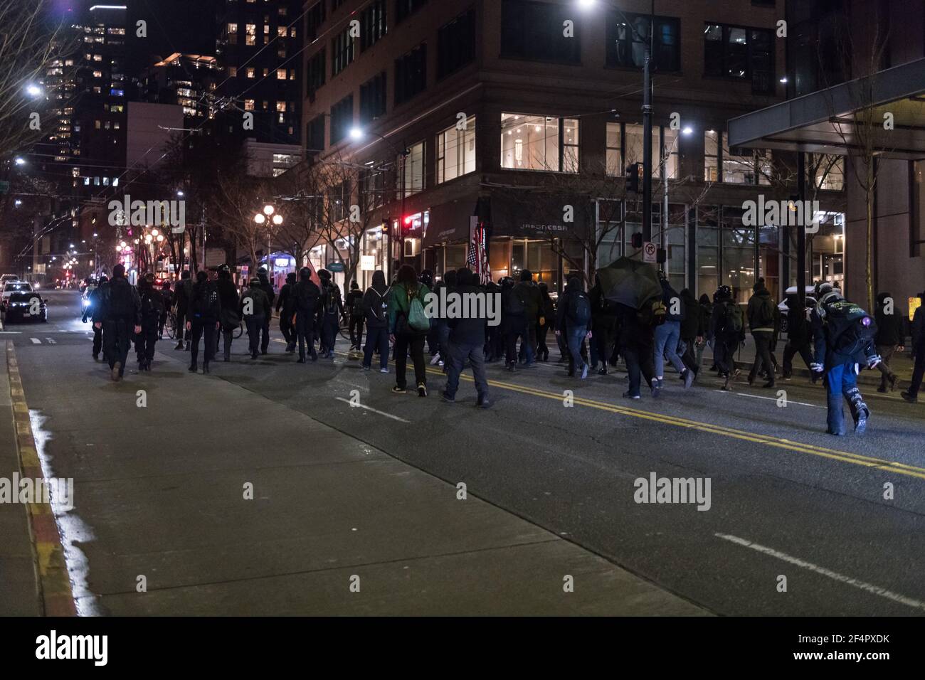 Seattle, USA. 20 Jan, 2021:  Early in the evening protestors marching during the abolish Ice inauguration protest. Stock Photo