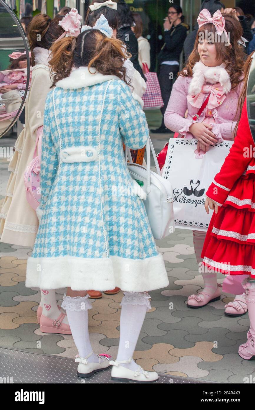 lolitas A group of young Japanese lolitas wearing pastel coloured coats chat on the  pavement, Harajuku, Tokyo, Japan Stock Photo - Alamy