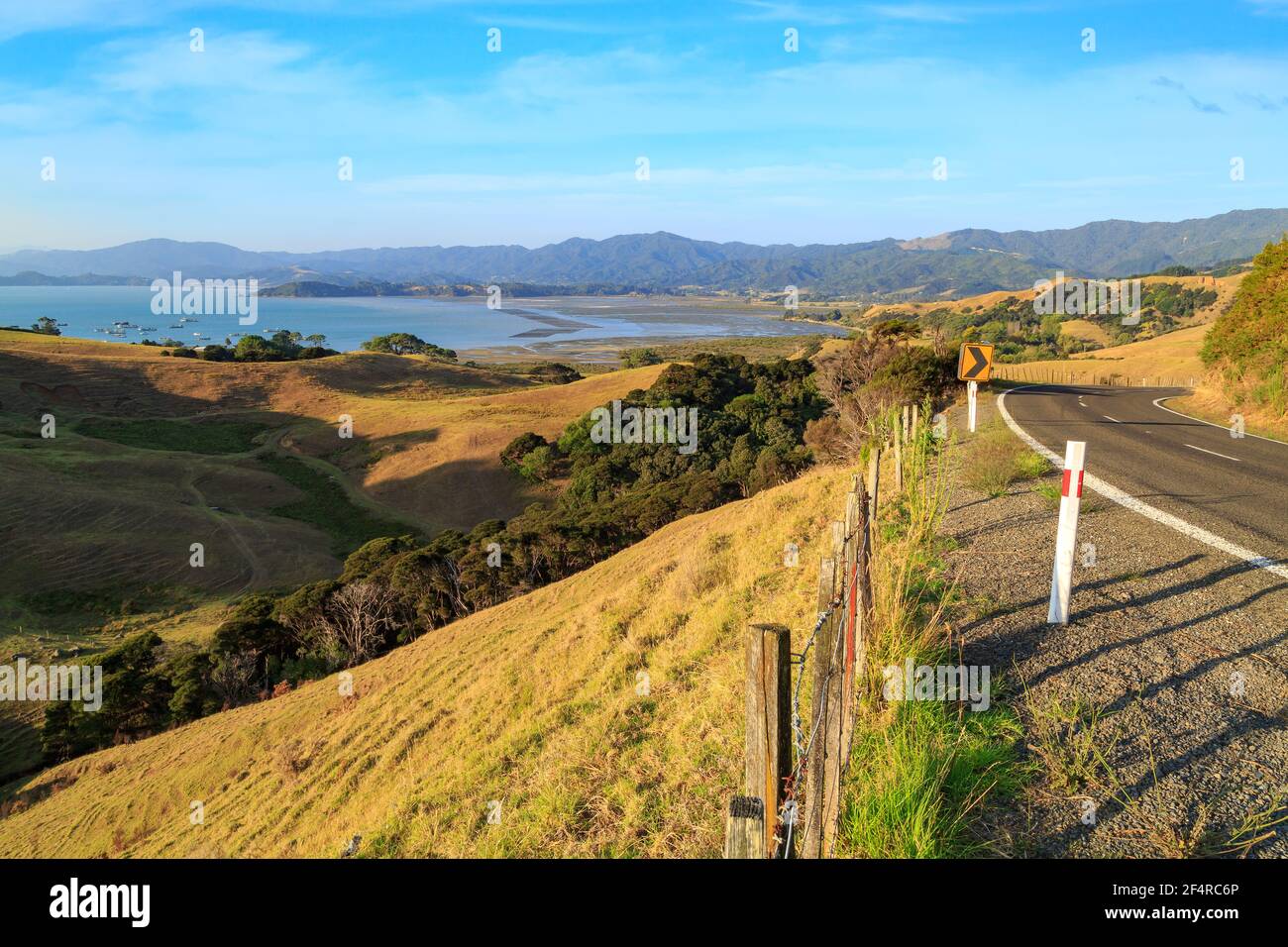 The road into Coromandel township, New Zealand. At the top of the photo