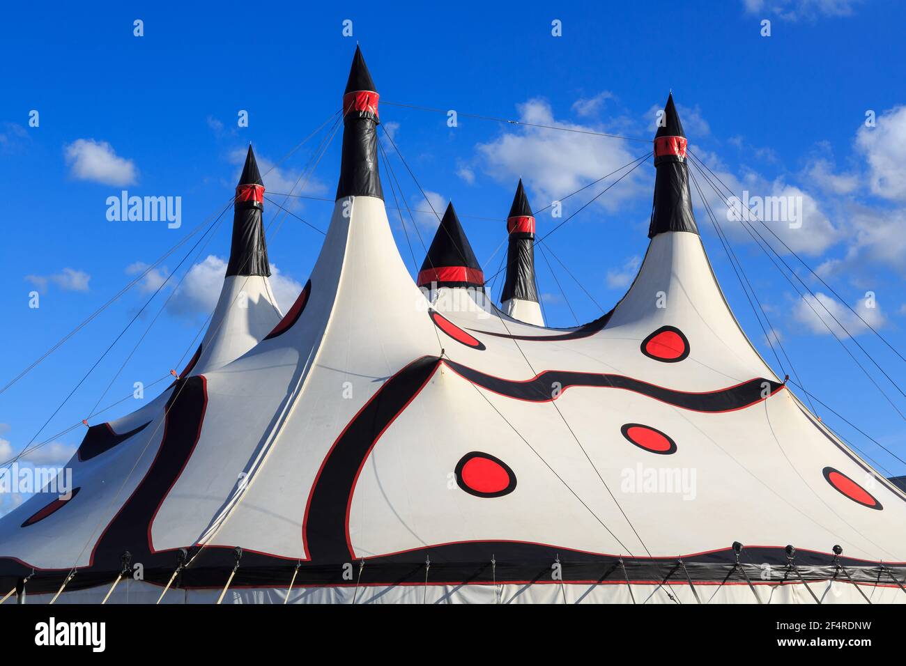 A white circus tent, with a pattern of dots and swirls Stock Photo