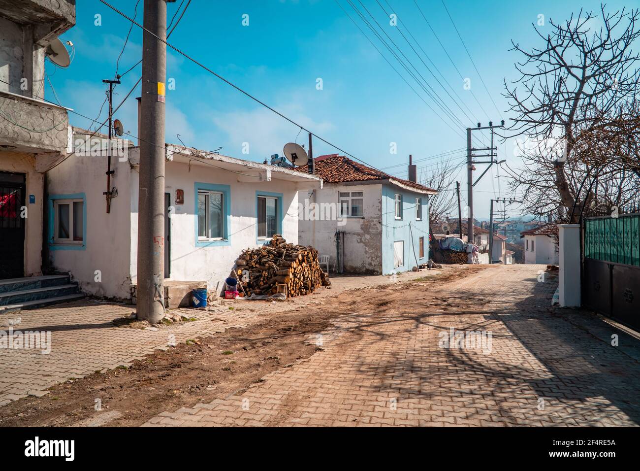 Kiyikoy, Turkey - February 25, 2021 - a street with typical houses in the fishing town of Kiyikoy on the Black Sea in northwestern Turkey Stock Photo