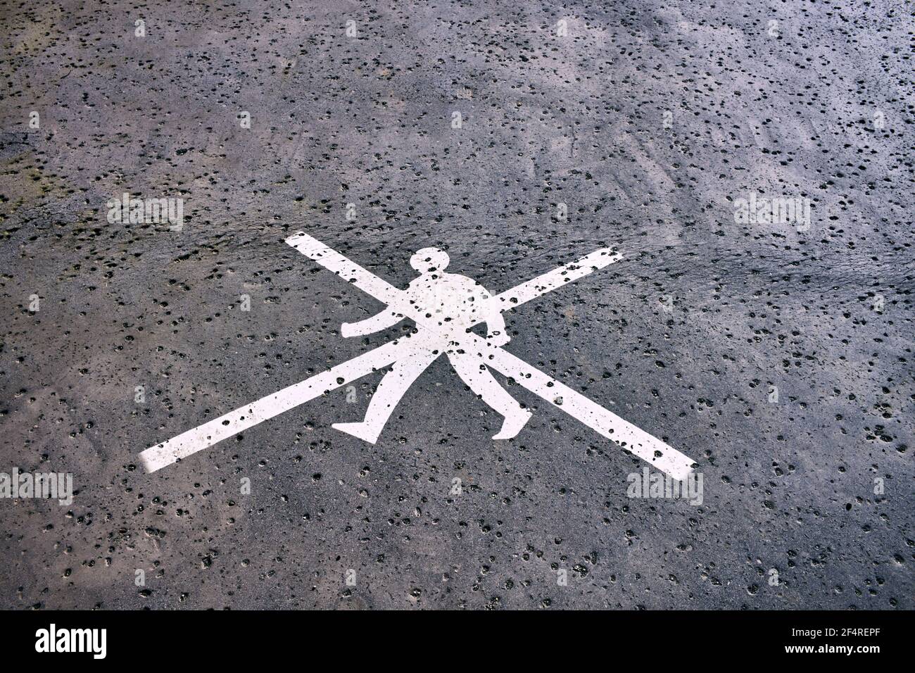 Crossed out person image on a tarmac surface Stock Photo