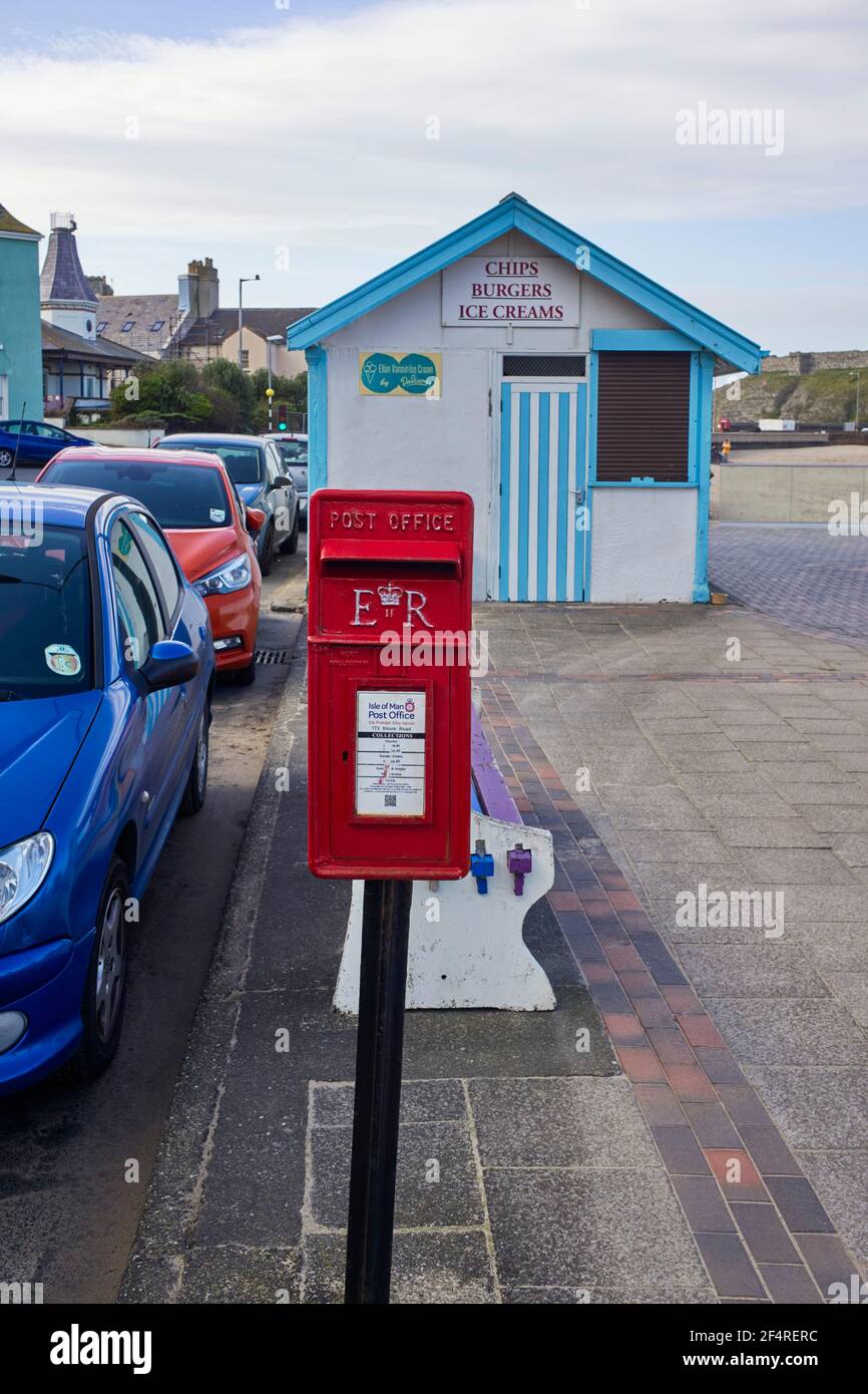 Small pedestal post box on Peel Prom, Isle of Man Stock Photo