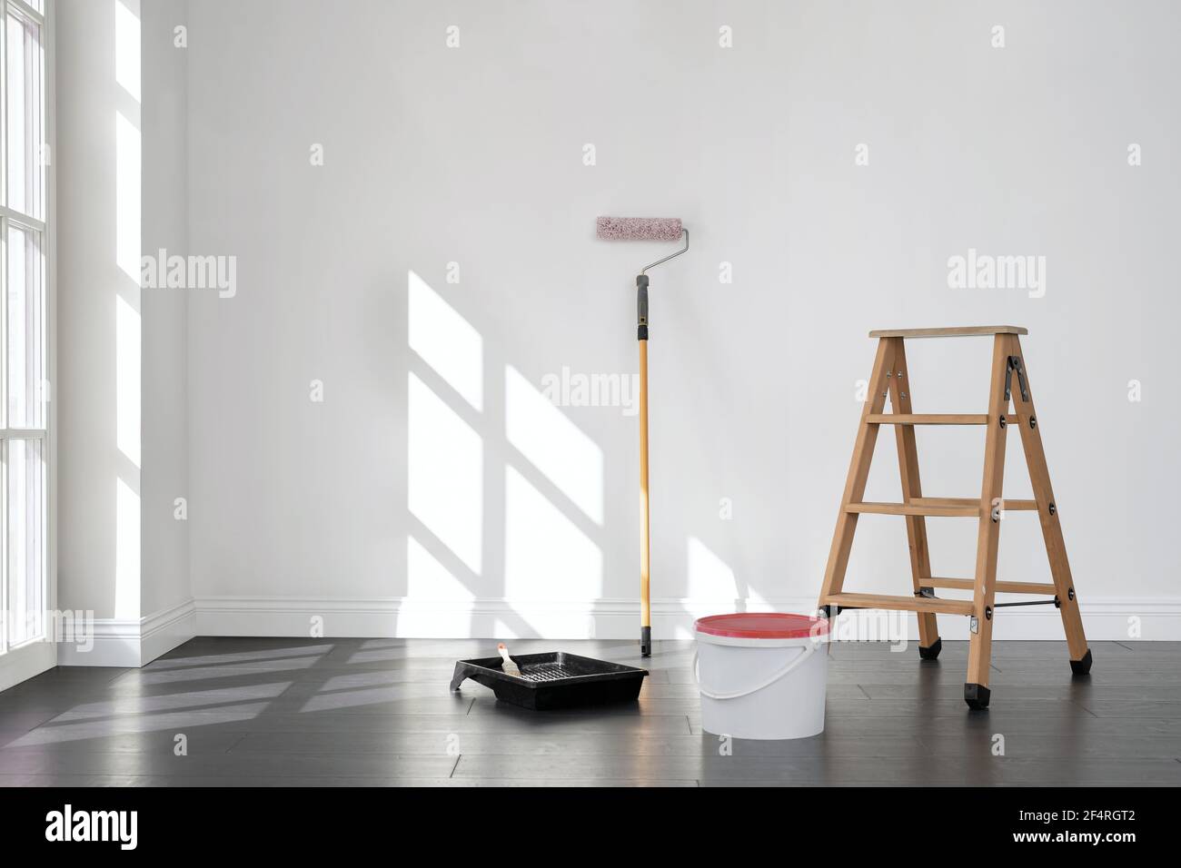 Painting the room, empty apartment ready for renovation, with copy space Stock Photo
