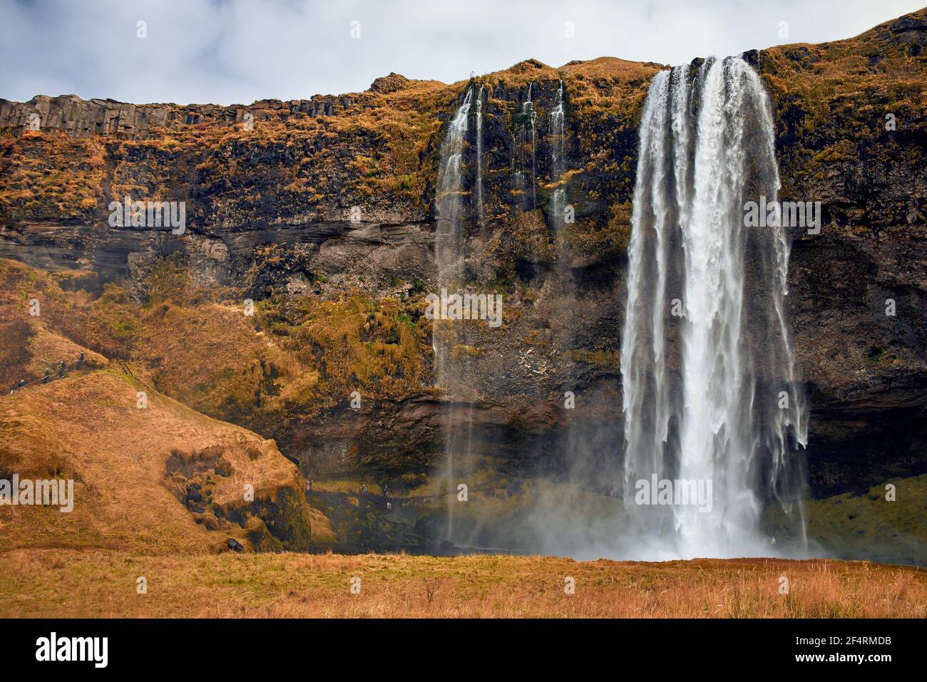 Iceland seljalandsfoss waterfall people mist hi-res stock photography ...