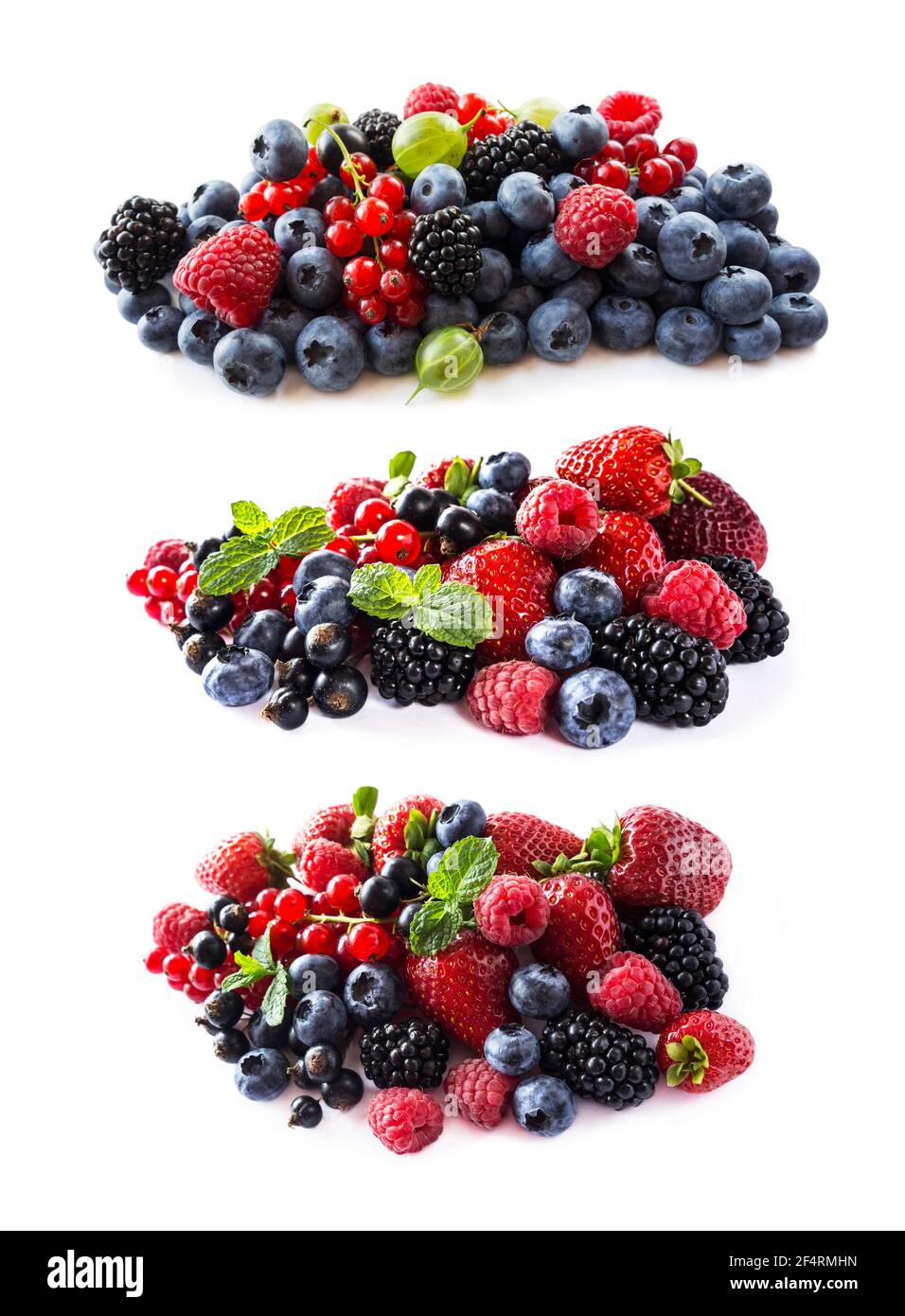 Berries isolated on white background. Ripe blueberries, blackberries, blackcurrants, raspberries, gooseberries, strawberries and red currants. Mix fru Stock Photo