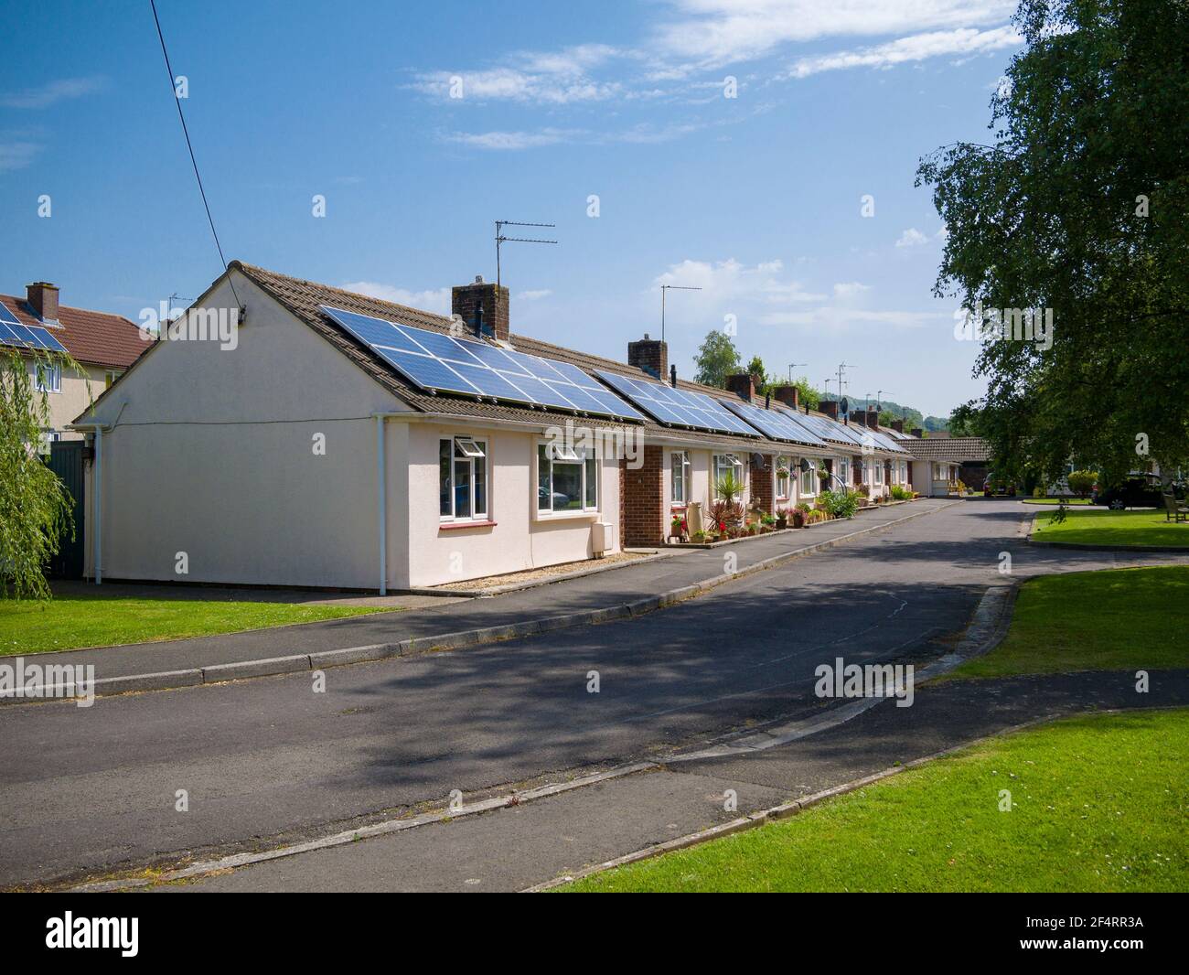 Retirement bungalows with solar panels fitted to the roofs in the rural